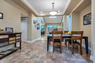 Formal Dining room open to living room and family room.