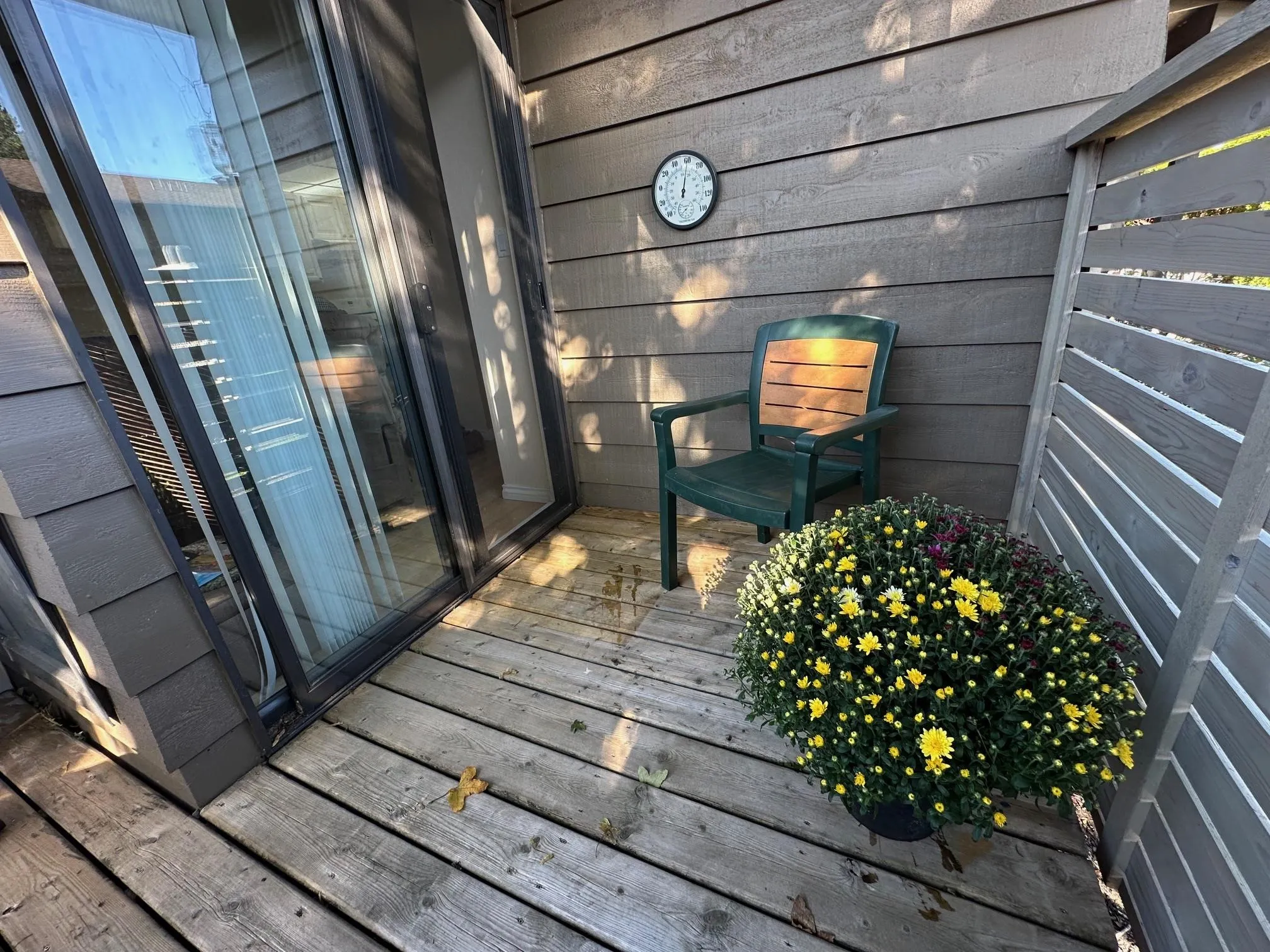 The deck off the kitchen/family room is also fully fenced for privacy. This fencing was upgraded at the complex in 2024.