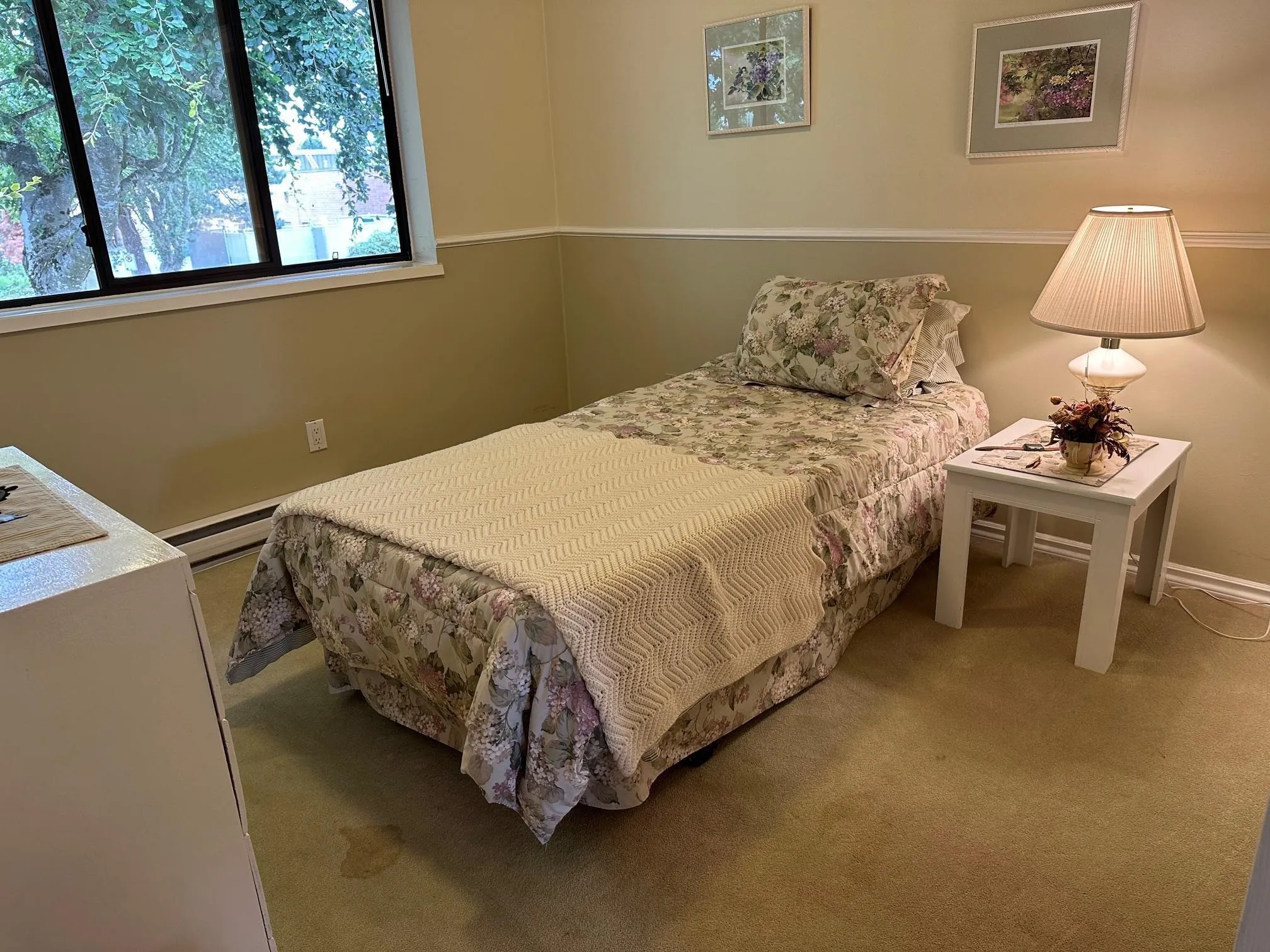 The second bedroom looks out on the park. You might feel like you are sleeping in a treehouse as you look out onto the treetops.