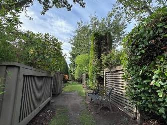 Gate access to the back yard means easy access to the park's walking trails or the short cut to the shopping center!