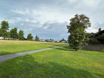 Maple Village is an 87-unit strata corporation situated on over 5 acres. This means space....notice the wide driveways! There are also garden walkways linking the Dunoon side of the complex to the No 3 Road side and visitor parking for guests!