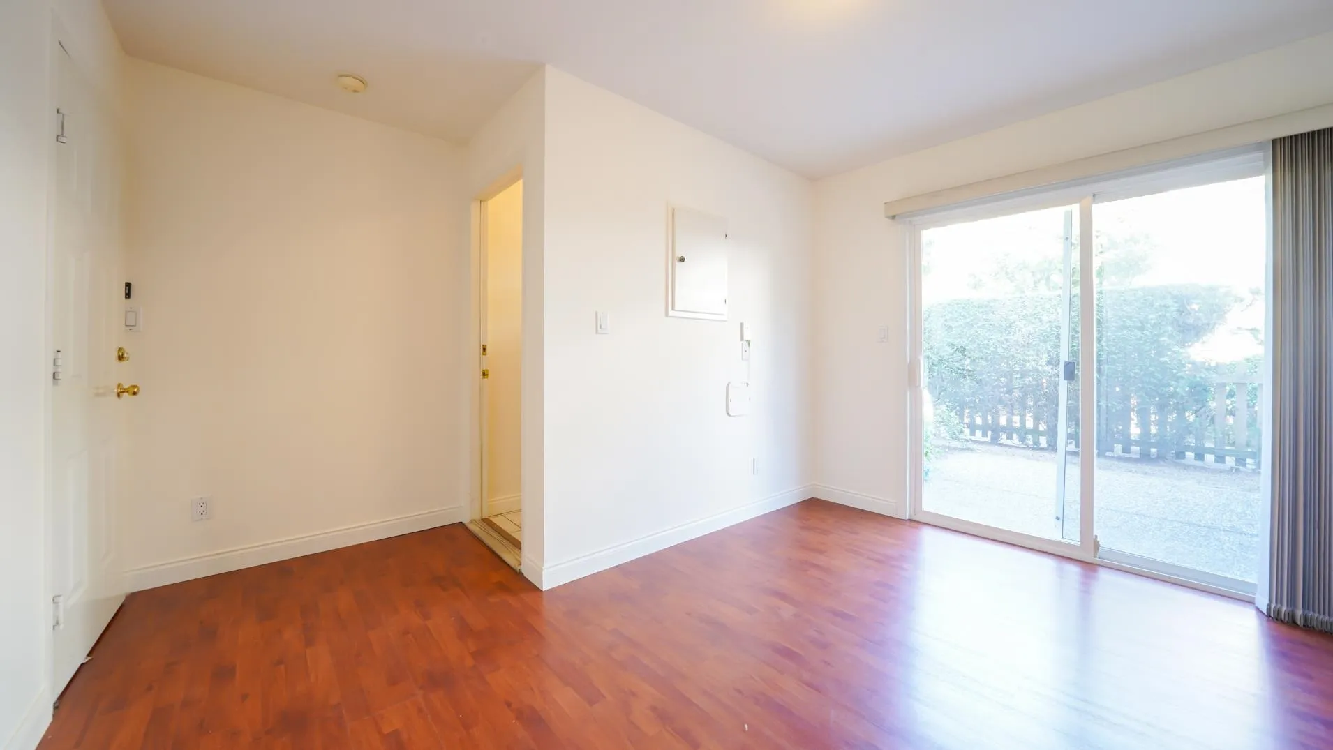 This den leads out to the serene patio, can be a 4th bedroom!