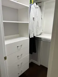 Walking closet in master bedroom