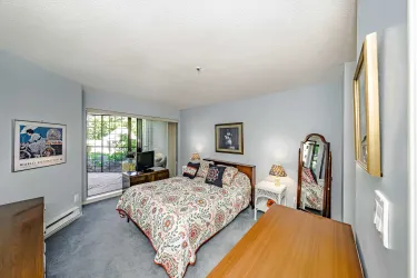 Large primary bedroom, with access to the covered sun room/patio area!