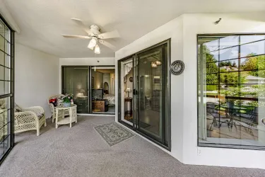 Huge, covered sun room to enjoy every day, rain or shine!