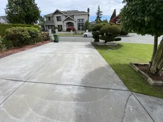 Pavement in front of garage.