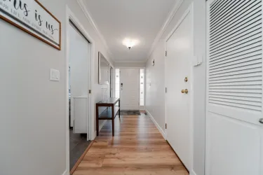 Garage leads into main entry hallway as does the front door.   This unit had its own hot water tank and furnace.