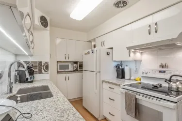 Extra cabinetry and a microwave shelf added during renovations!