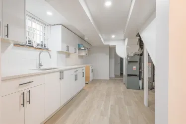 Photo before appliances arrived. Fridge and Stovetop included