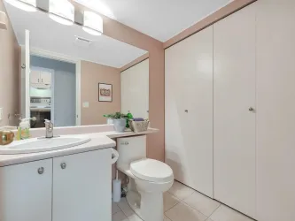 main floor bathroom near entry and main living areas. Washer and Dryer conveniently located in this space