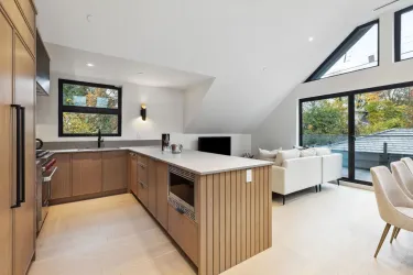 Sub Zero Integrated Fridge, Wolf 6 Burner Stove, Matte finish quartz countertops.