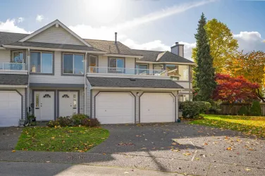 Single garage with two open parking spots.