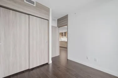 Modern, spacious bedroom closet with led lights