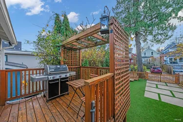 Deck off the main floor kitchen area, facing back yard (south).