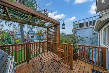 Deck off the main floor kitchen area, facing back yard (south).