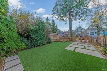 Backyard (south facing) plenty of natural light, newly landscaped with turf & fully fenced.