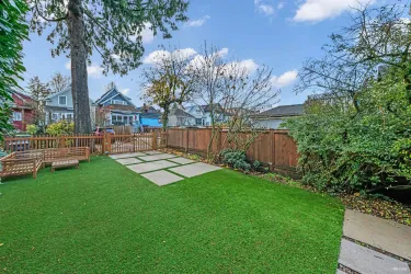 Backyard (south facing) plenty of natural light, newly landscaped with turf & fully fenced.