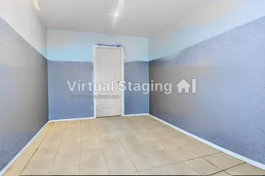 This is the extra area you can use as a storage , dining area. towards the double attached garage. There is washer and dryer off the door, storage area as well.