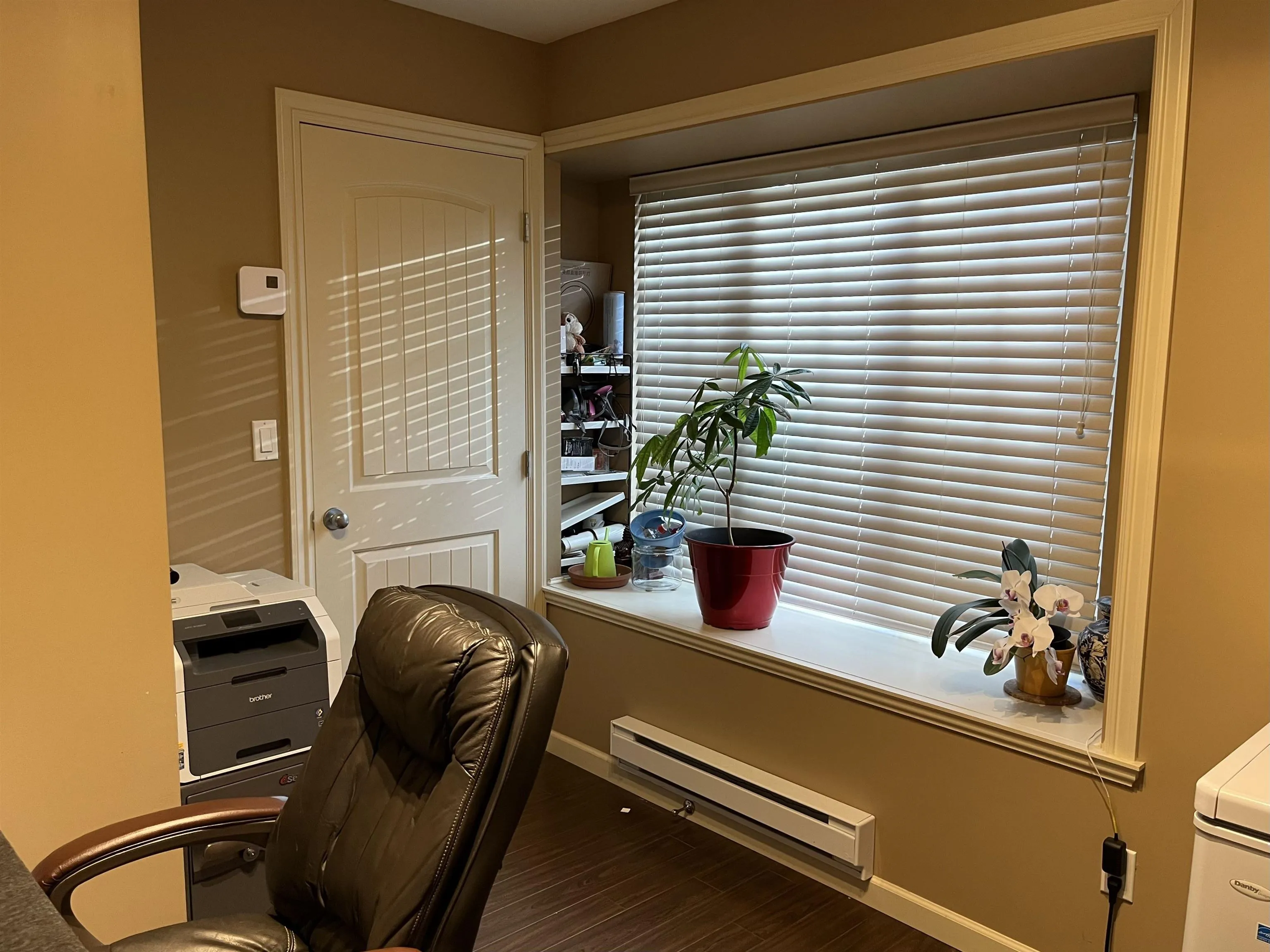 Bedroom downstairs, currently used as an office.